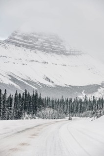 Winter road trip on the Icefields Parkway with lots of snow and ice, Banff National Park, Jasper