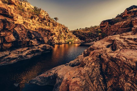 Bell Gorge waterfall, a body of water in north-west Australia in the Kimberley. Sunrise in the