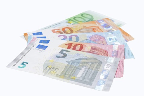 Various euro banknotes on white background, 5 euro, 10 euro, 20 euro, 50 euro, 100 euro