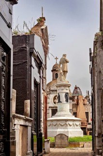 Burial site next to church and dome, architecture in sacred style, La Recoleta cemetery in Buenos