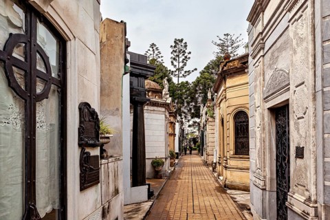Historic tombs with marble structures and a peaceful atmosphere, La Recoleta cemetery in Buenos