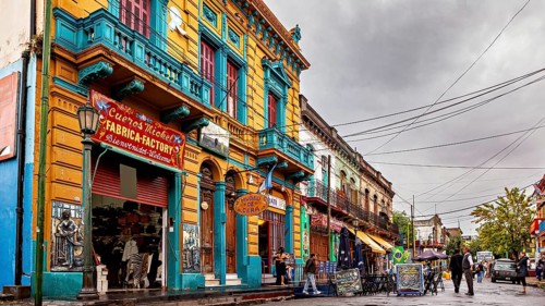 Traditional colourful building facade of a shop on a city street, The colourful city and tango