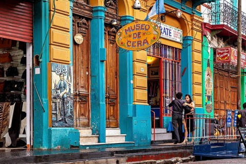 Entrance to a traditional museum with colourful building design and decorative lettering, The