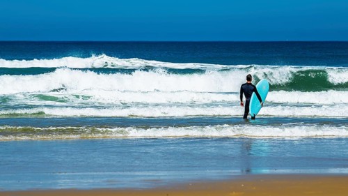 Surfer on Contis beach, Saint Julien en Born, Saint-Julien-en-Born, Landes, France
