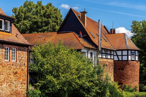 The old town centre with half-timbered houses, church towers and remains of the town wall in
