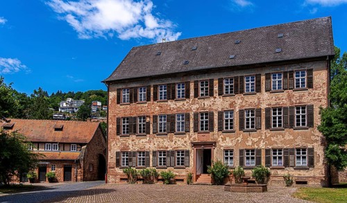 The old castle with Barbarossaplatz and the castle café in the old town centre of Büdingen, Hesse,