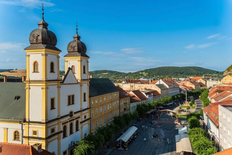 View from the city tower of the Piarist Church of St Francis Xavier and the old town in the evening