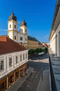 View from the city tower of the Piarist Church of St Francis Xavier and the old town in the evening