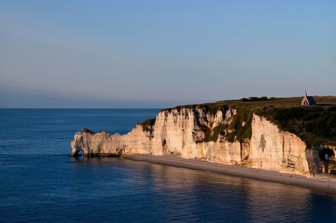 Rock arch Falaise or Porte d'Amont, beach, church Chapelle Notre Dame de la Garde, Étretat, sea,