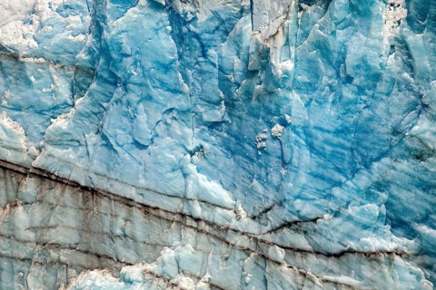 Close-up of blue ice surface with fine lines and natural patterns, The ice of the Perito Moreno
