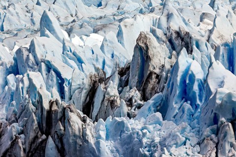 Impressive image of blue and grey glacier peaks in a frozen landscape, The ice of the Perito Moreno