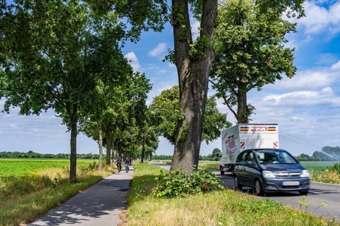 Country road south of Kampen, on the Lower Rhine, with side cycle and footpath, North