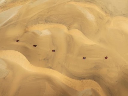 Quad bikes in the dunes of the Namib Desert in the vicinity of the coastal town of Swakopmund.