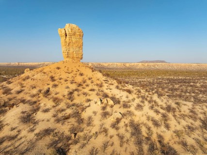 The Vingerklip (rock finger) and the Ugab Valley Terraces are surrounded by thornbush and mopane