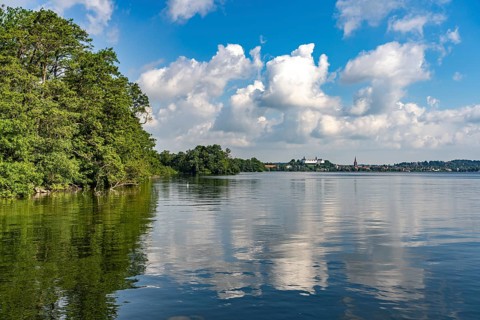 The Great Plön Lake, Nikolai Church and Plön Castle in Plön, Schleswig-Holstein, Germany