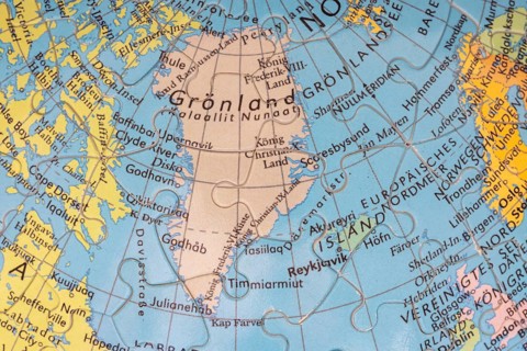 Puzzle globe. Map made from puzzle pieces. Greenland and Denmark