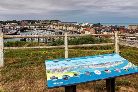 View from a viewpoint with information sign over a harbour and the coast, The harbour of Dieppe in
