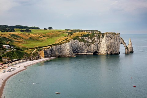 Famous cliff formation with grassy landscape and calm sea, The cliffs and alabaster coast of