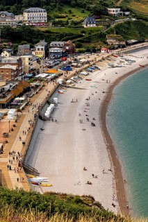 Aerial view of a beach with promenade and people playing, Etretat in Normandy, France