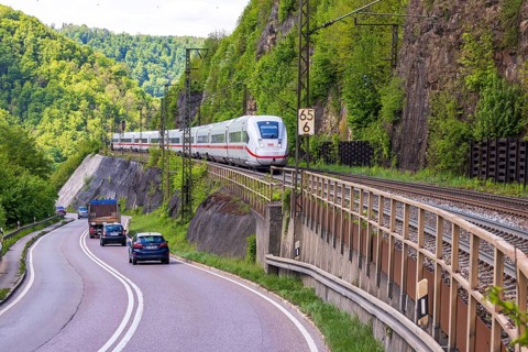 InterCityExpress ICE en route on the winding railway line of the Geislinger Steige. Landscape on