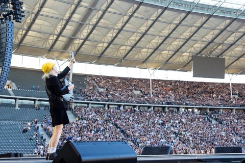 Angus Young, lead guitarist of AC/DC live on Power Up Tour 2025 at the Olympiastadion Berlin on 30