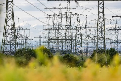 Many high-voltage power lines and lattice towers in the district of Ludwigsburg near Besigheim,