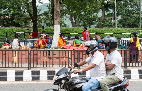 Devotees staying in street divider as they arrives to visit Kamakhya Temple during Ambubachi Mela,