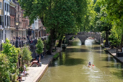 The old town centre of Utrecht, Oudegracht, around 2 km long with many old houses, shops,