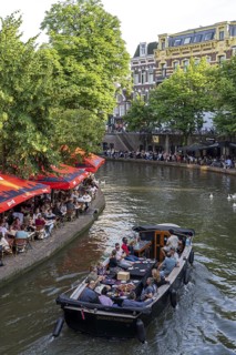The old town centre of Utrecht, Oudegracht, around 2 km long with many old houses, shops,