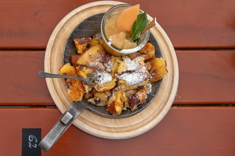 Kaiserschmarrn with apple sauce served in a small pan, Franconia, Bavaria, Germany