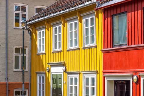 Norway, scenic Trondheim town. Bakklandet, a famous tourist travel destination with colorful houses