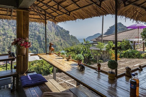 Stairs lead down to the Doi Phamee coffee shop and restaurant in Mae Sai district of Chiang Rai,