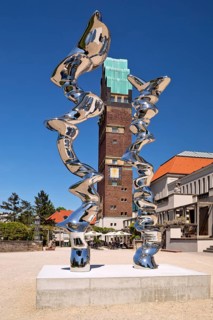 Stainless steel sculpture entitled Points of View by Tony Cragg in front of the Wedding Tower,