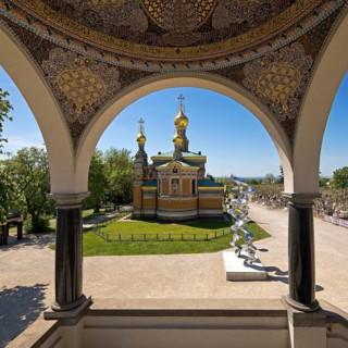 View from the pavilion to the Russian Chapel with the stainless steel sculpture by Tony Cragg,