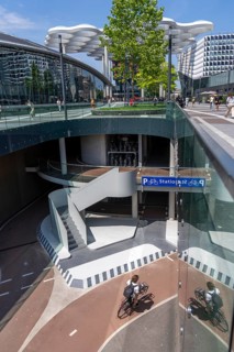 Entrance and exit to the central bicycle car park at Stationsplein, the largest bicycle car park in