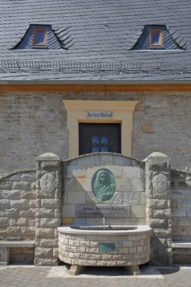 Historic Borlach Tower and museum with fountain and relief by Johann Gottfried Borlach, landmark,
