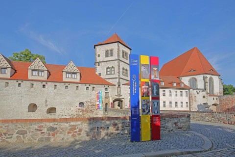 Moritzburg castle built in 1484 and entrance with banner to the art museum, Halle an der Saale,