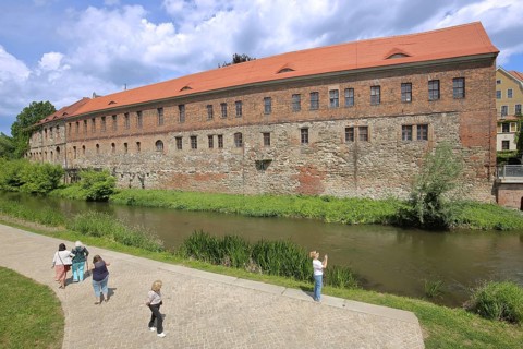 New Residence built in 1531 with bank of the millrace, pedestrian, photograph, Renaissance, Halle