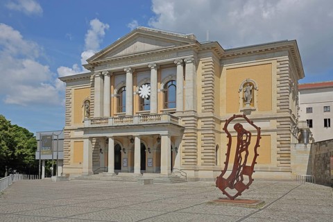 Opera House with sculpture Reliquie Mensch by Michael Morgner 2011, rusty steel sculpture, Modern