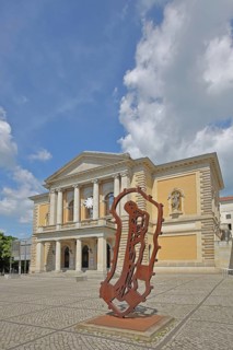 Opera House with sculpture Reliquie Mensch by Michael Morgner 2011, rusty steel sculpture, Modern
