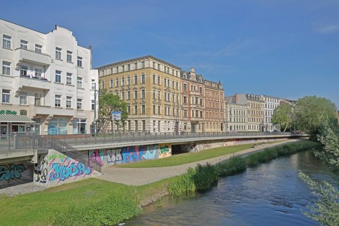 Historic houses on the Robert-Franz-Ring with millrace, stream, bank, Halle an der Saale,