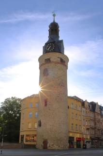 Historic Leipzig Tower built in the 15th century in backlight, sunbeams, former watchtower and part