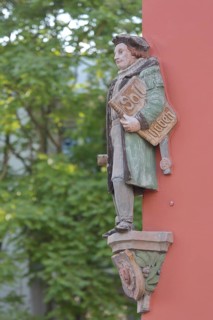Historical merchant from the 16th century with book and inscription Soll Haben, created in 1933,