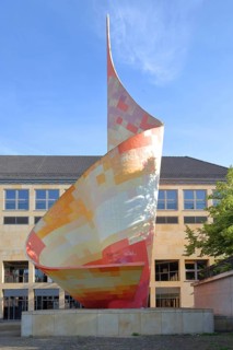 Sculpture flag monument created 1967, flame of revolution, modern art, colourful, spiral, pointed,