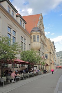 Historic street pub with people, building with bay window, Große Nikolaistraße, Halle an der Saale,