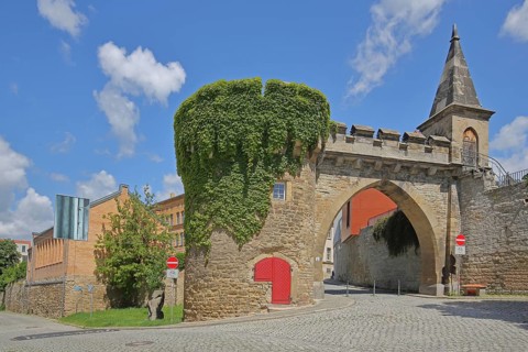 Historic Crooked Tor, city gate with archway, tower, city fortification, city wall, Merseburg,