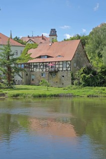 Saale river and historic half-timbered house Neumarktmühle, Saale valley, Merseburg, Saxony-Anhalt,