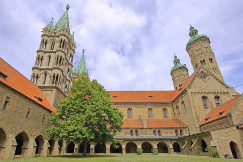 Late Romanesque UNESCO Cathedral of St Peter and St Paul with twin towers, inner courtyard with