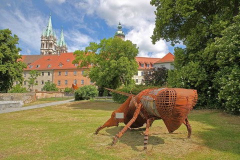 Sculpture The Bee by Ronald Knoll, modern art, rusty steel sculpture, bee figure, insect figure,