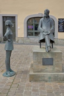 Monument to philosopher Friedrich Nietzsche, bronze sculpture, modern art, standing female figure,